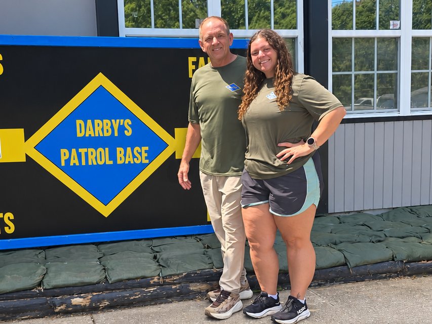 Darby and her dad outside Darby's Patrol Base