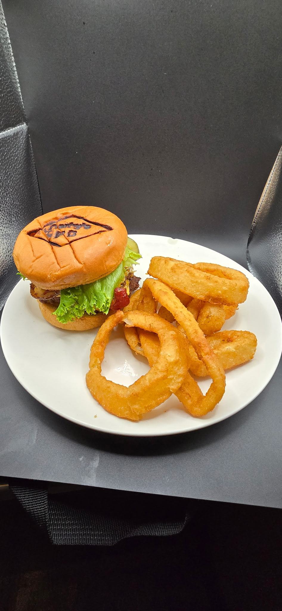 The Darby’s Burger with onion rings