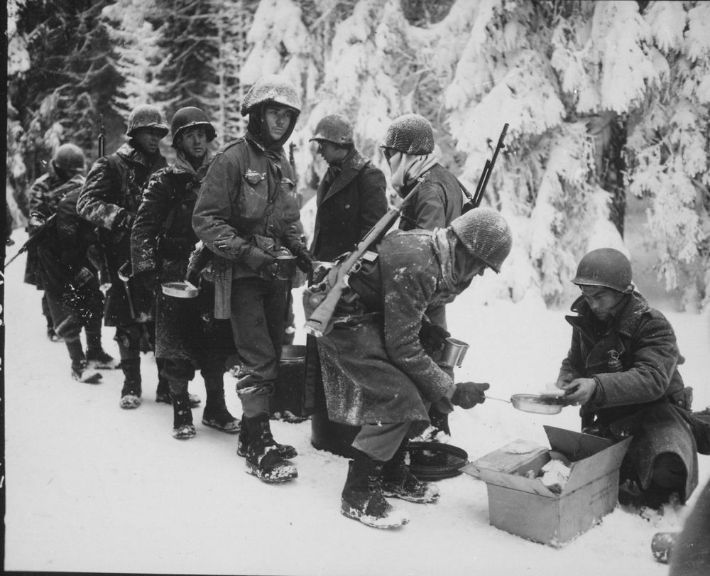 Chow line in the snow, 347th Infantry, 1945