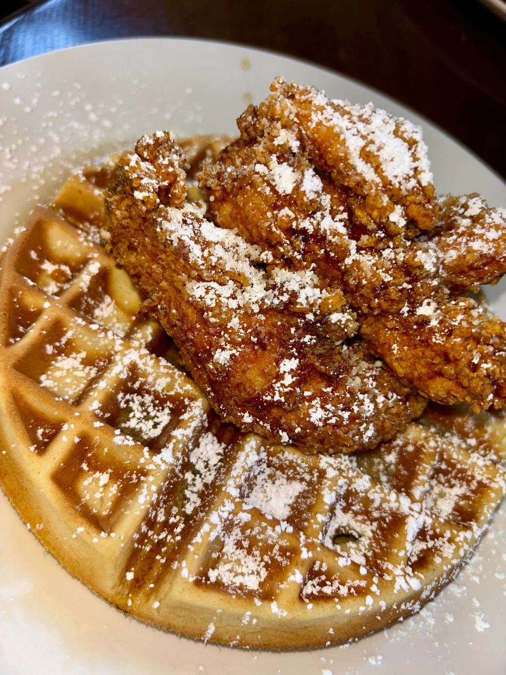 Waffle with fried chicken fingers